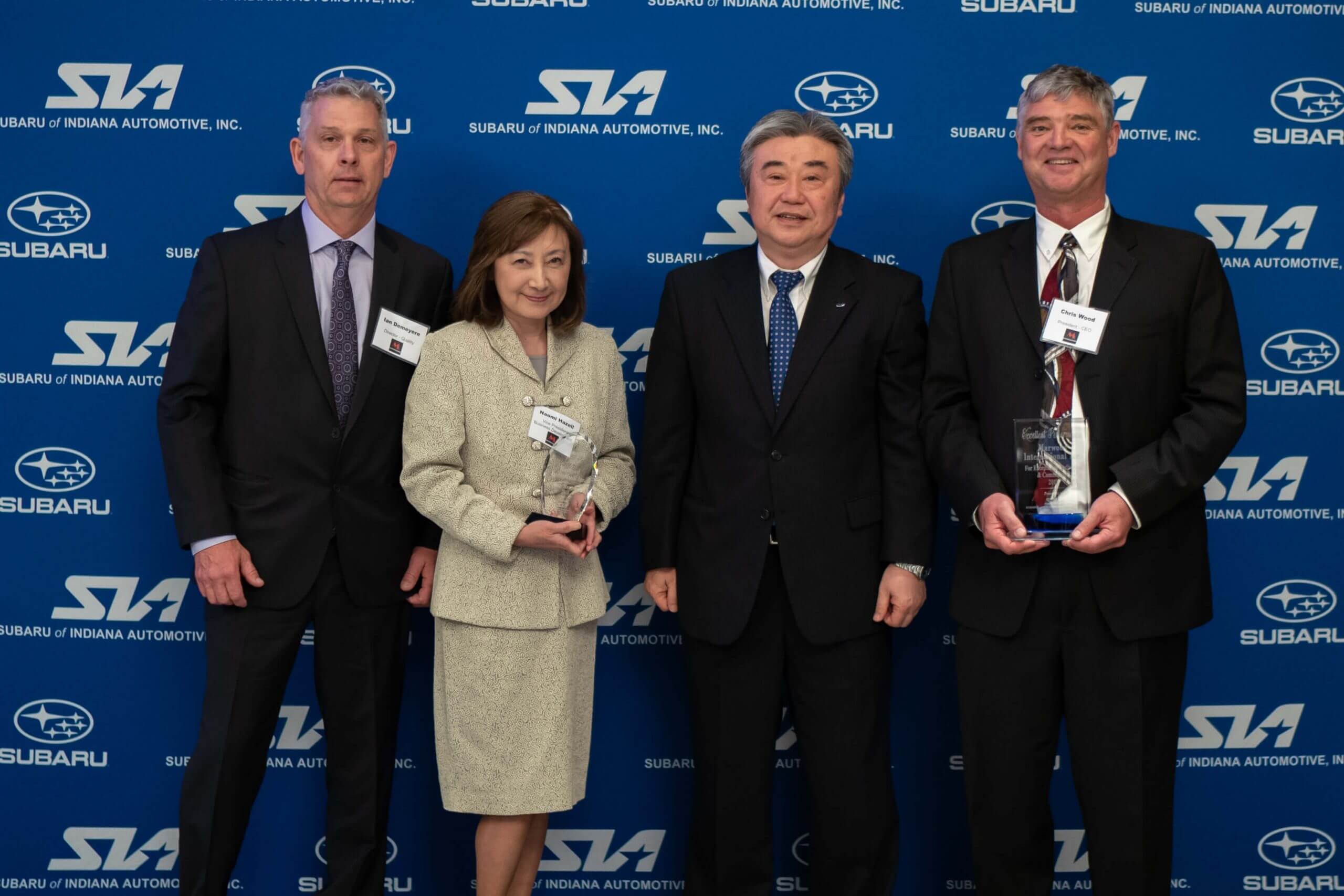 A Image of Chris Wood our CEO receiving A award for Marwood from Subaru